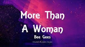 More Than A Woman Lyrics